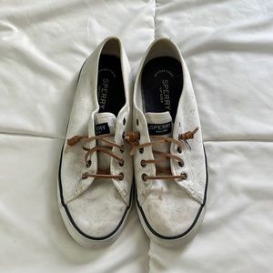 Sperry white boat shoes. Some stains and wear.